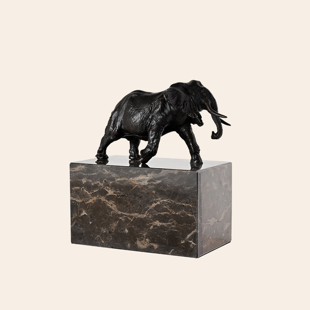 BRONZE ELEPHANT ON GRANITE
