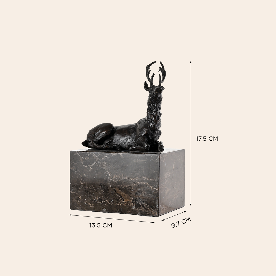 Bronze Sitting Deer Sculpture on Granite